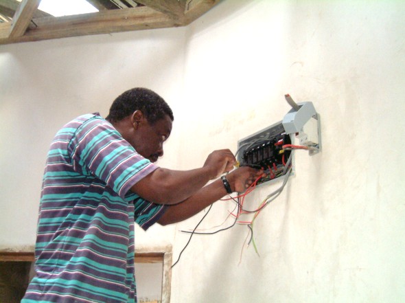 Ali Sanwaji makes the final electrical connections