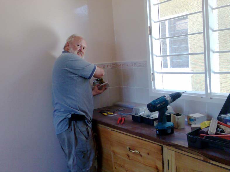 Electrical 2nd fix in tiled splashback to fitted cupboards
