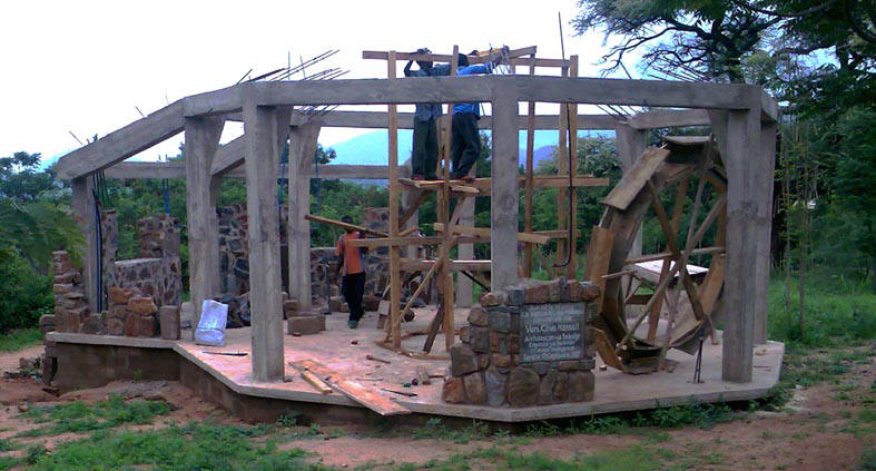 Whilst the carpenters erect a scoffold the masons have been busy building up the rear stone walls